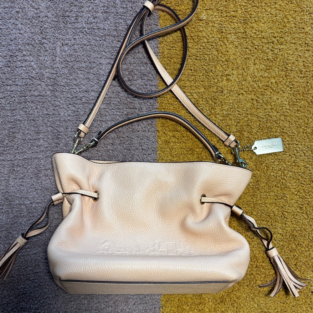 Authentic coach drawstring coral leather bag